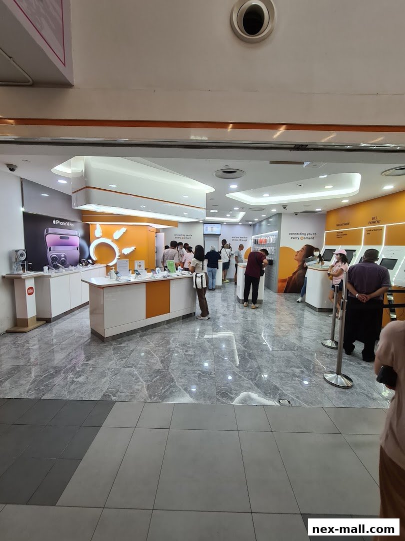 Interior view of a modern phone shop with customers and staff.