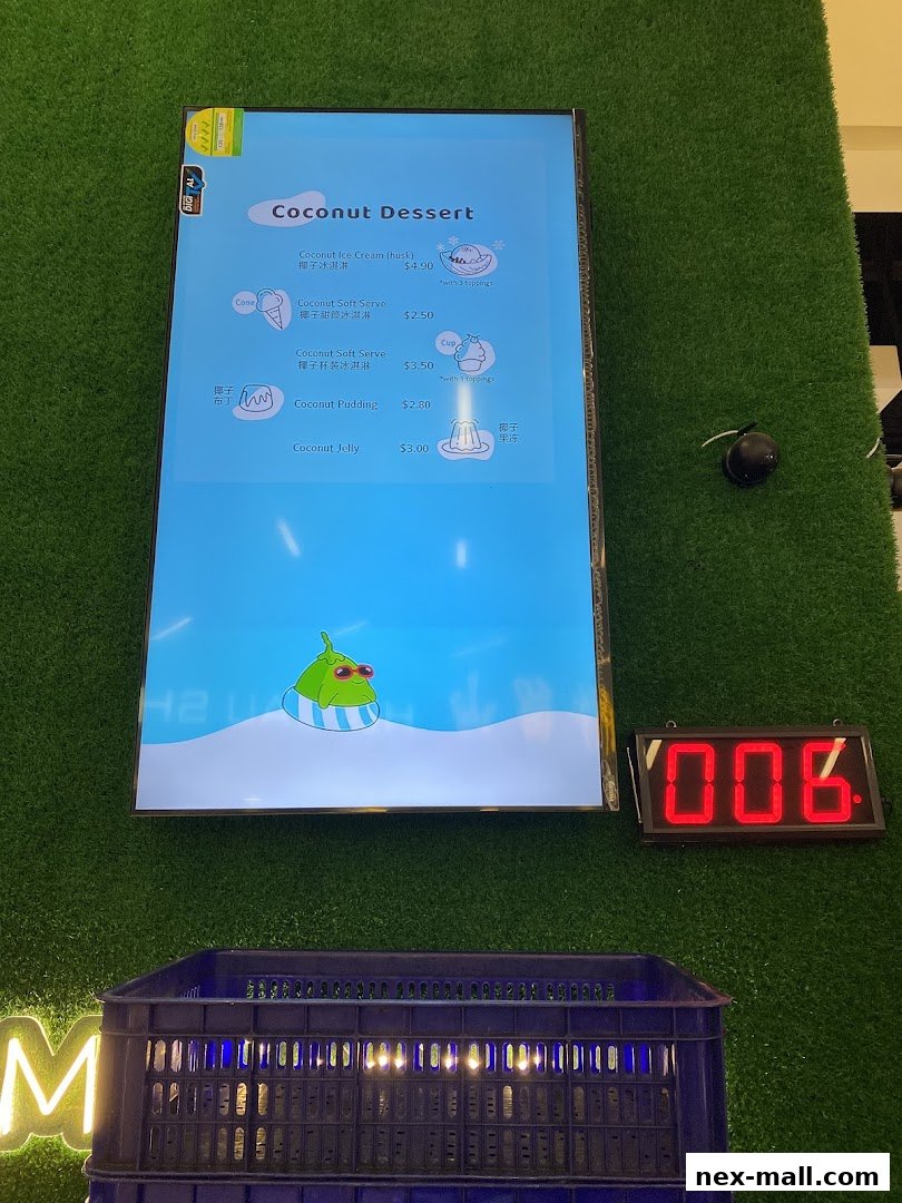 A digital menu displaying various coconut desserts with prices.