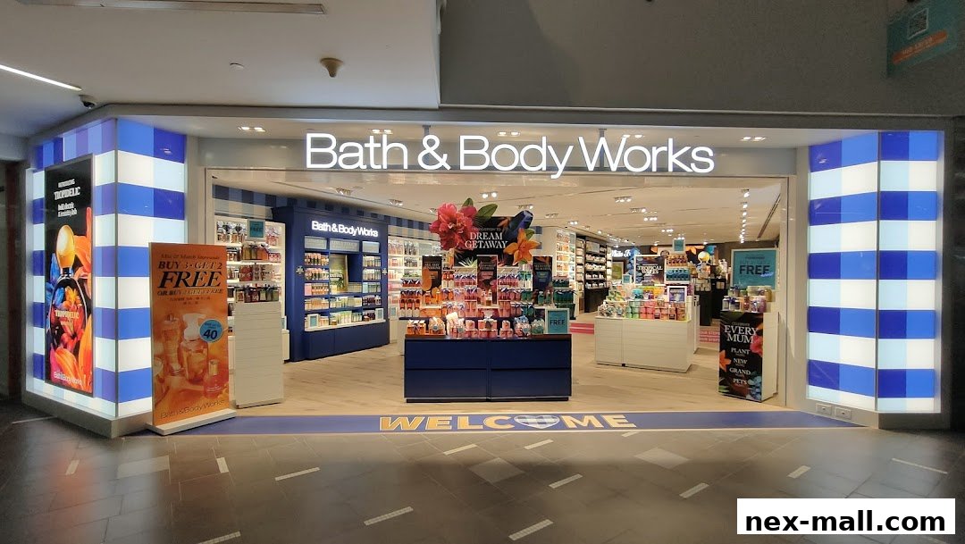 The entrance of a Bath & Body Works store, showcasing various scented products and promotions.