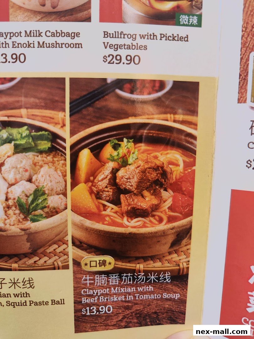 A close-up of a menu featuring claypot dishes with mouth-watering food photography.