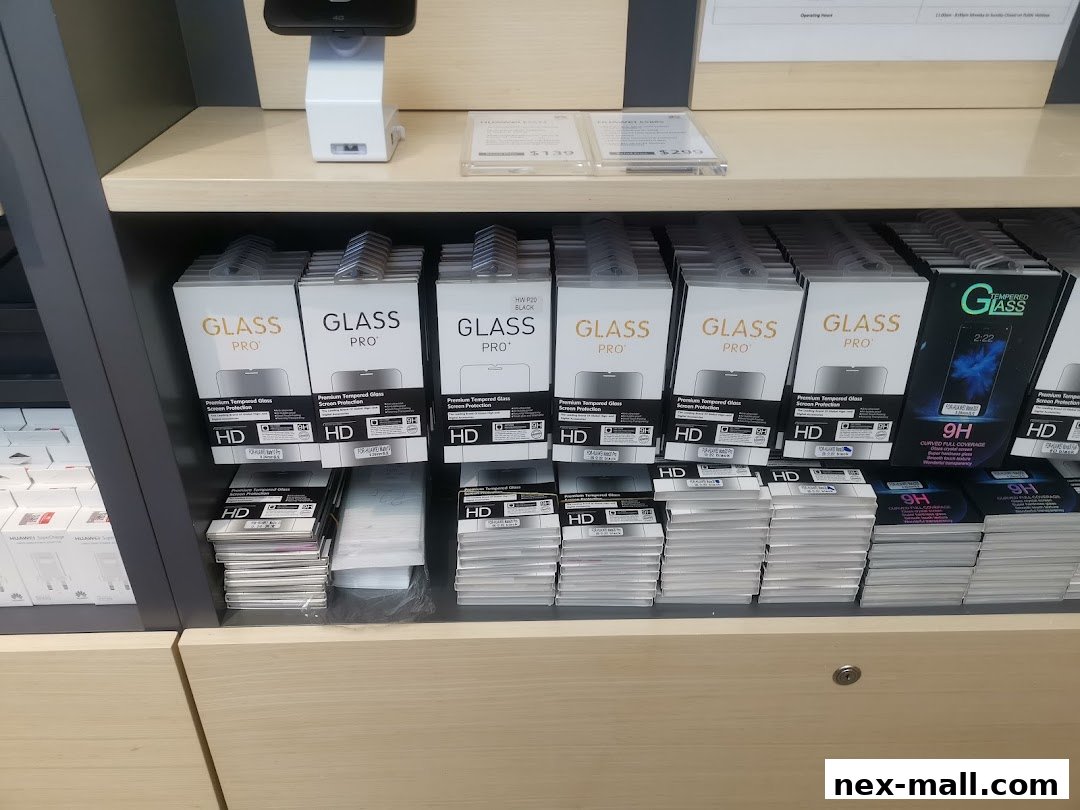 Shelves stocked with Huawei phone screen protectors and accessories.