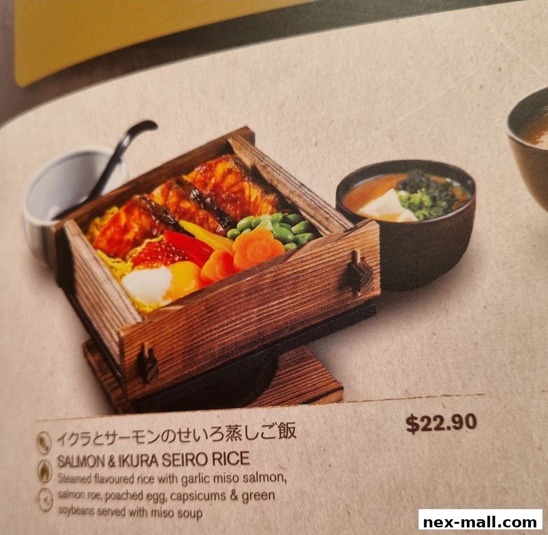 A close-up of a Salmon & Ikura Seiro Rice dish with miso soup.