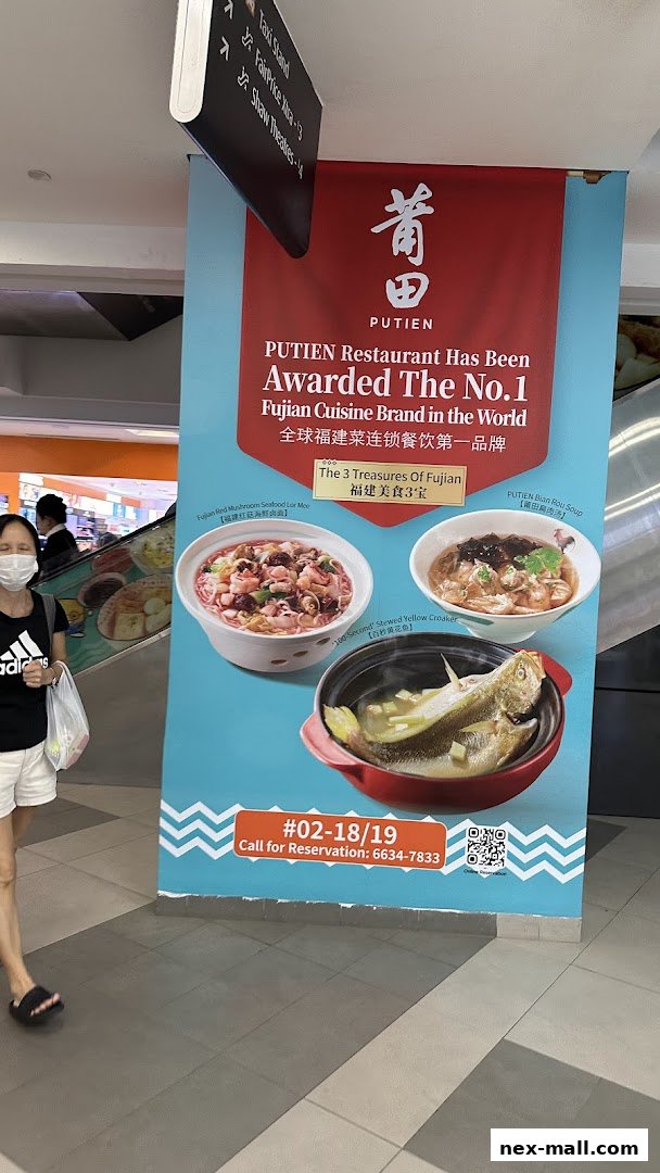 A banner advertising PUTIEN restaurant, showcasing Fujian cuisine and its award as the No.1 Fujian Cuisine Brand.