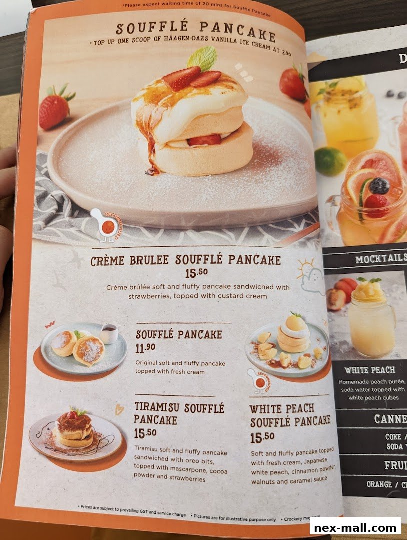 A menu page showcasing various soufflé pancakes and mocktails with enticing descriptions and prices.