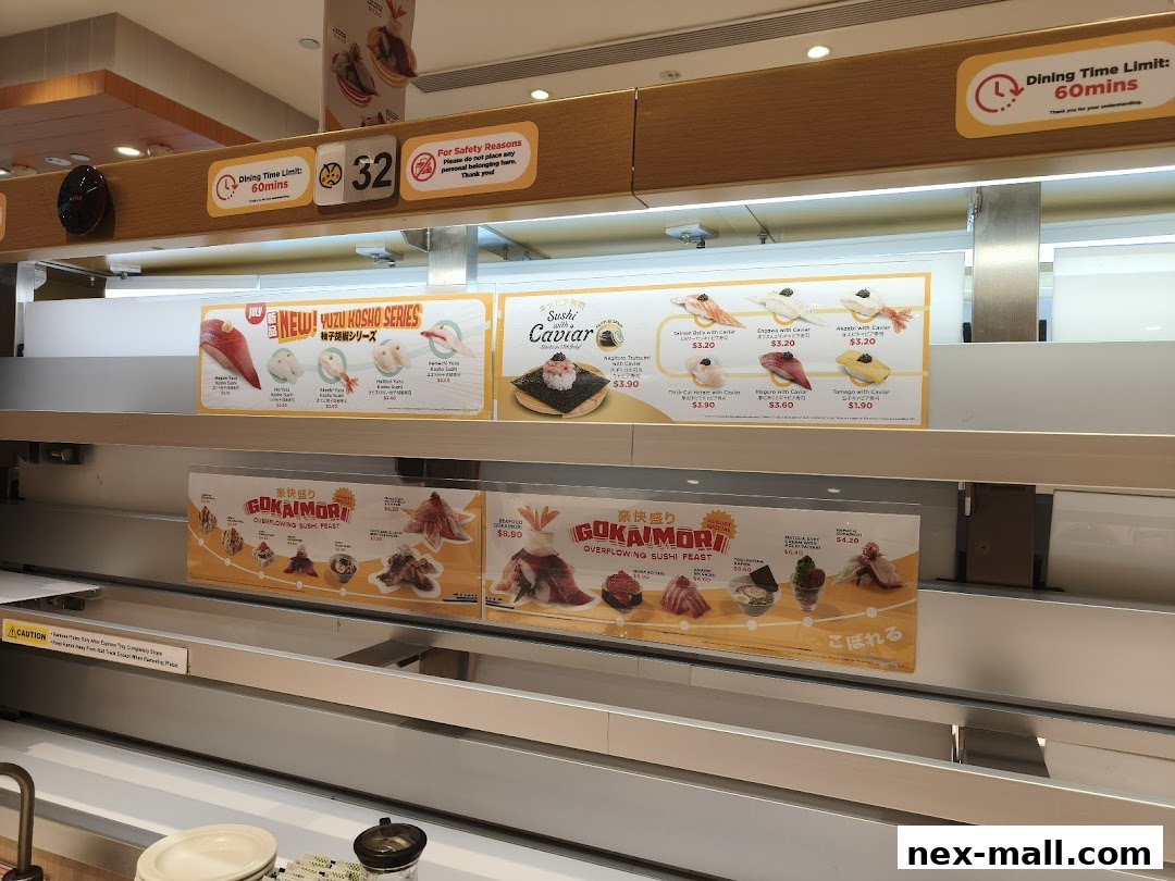 A conveyor belt sushi restaurant display featuring new Yuzu Kosho and Gokaimori sushi series.