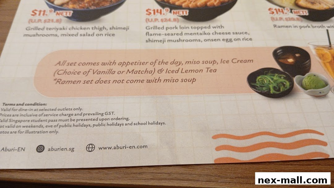 A menu from Aburi-EN Nex showcasing grilled dishes and set meal inclusions.
