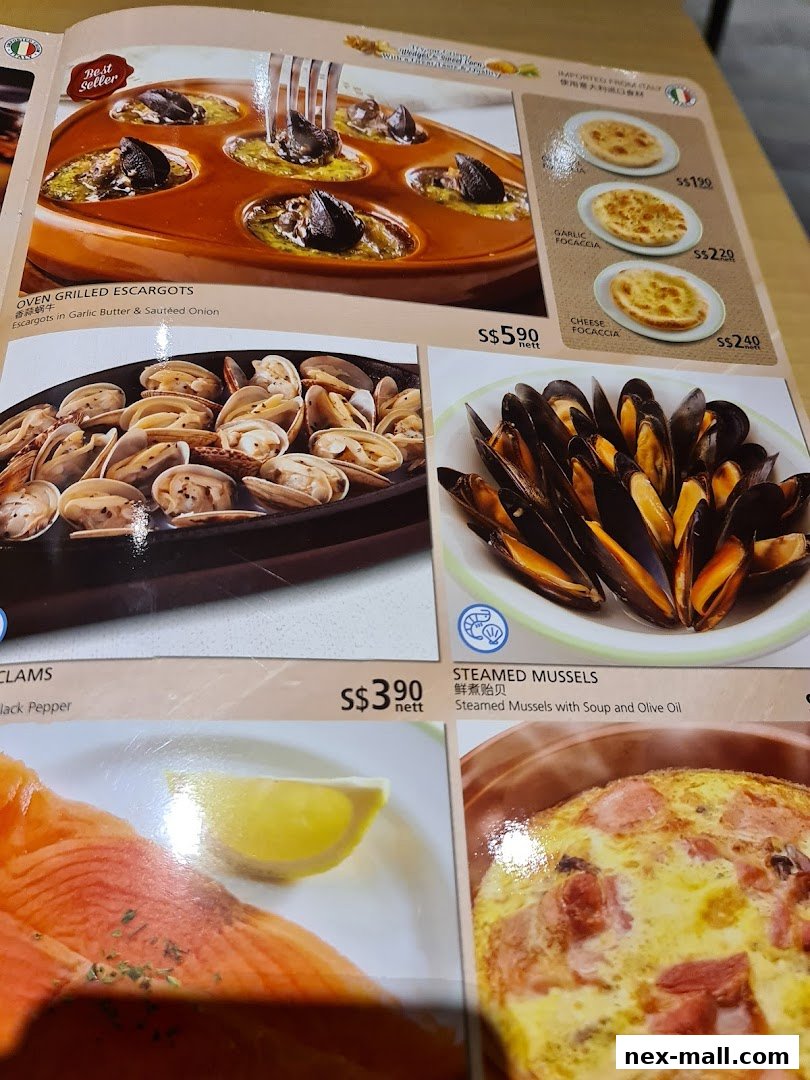 A menu featuring various seafood dishes and Italian focaccia bread.