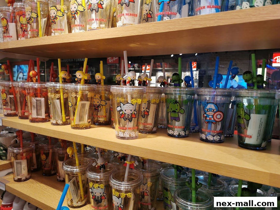 Shelves filled with Marvel Super Heroes themed tumblers with character toppers and straws.