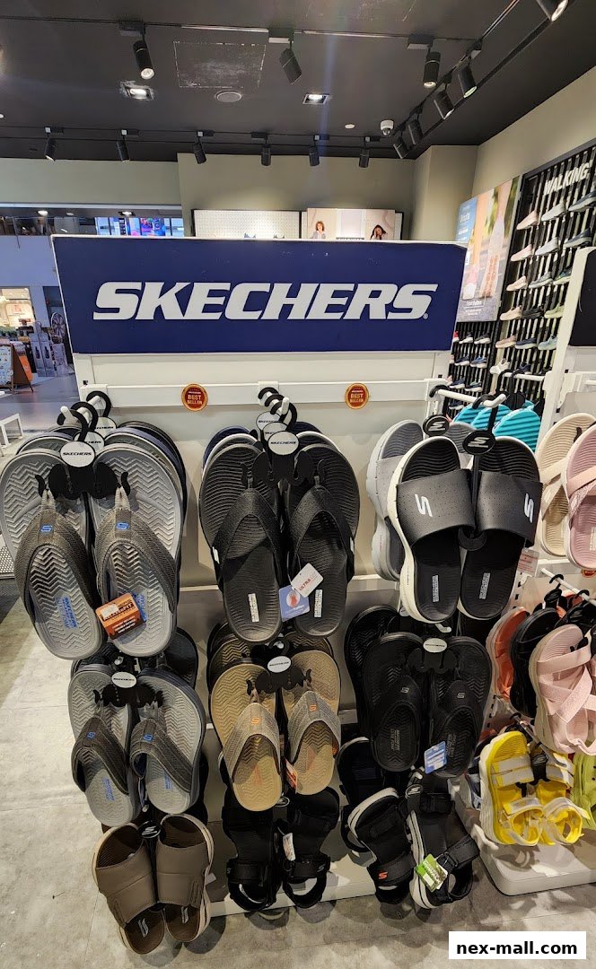 A display of Skechers flip-flops and sandals in various colors and styles.
