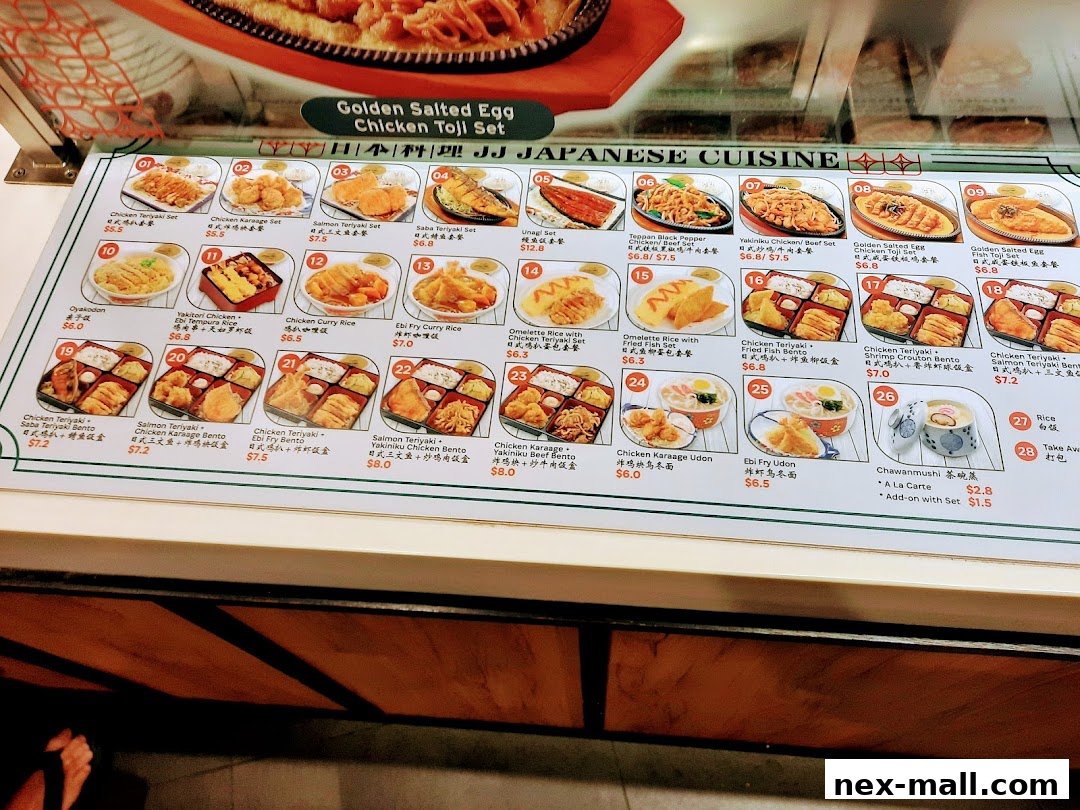A menu display for JJ Japanese Cuisine featuring various bento boxes, rice dishes, and udon.