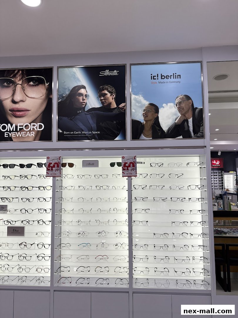 A display of various eyeglasses from brands like Tom Ford, Silhouette, and ic! berlin.