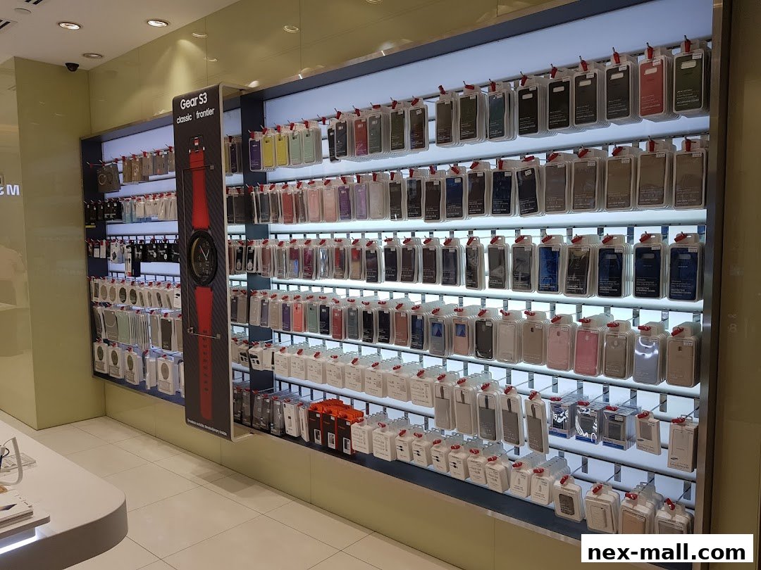 A wall display in a Samsung store showcasing numerous phone cases and a smartwatch.