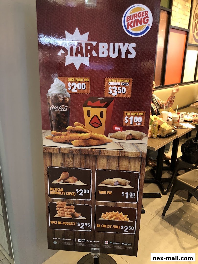 A Burger King promotional poster showcasing various food and drink items and their prices.