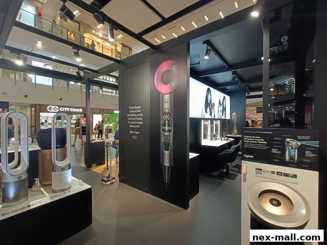 Interior view of a Dyson store showcasing air purifiers and hair dryers with product information.