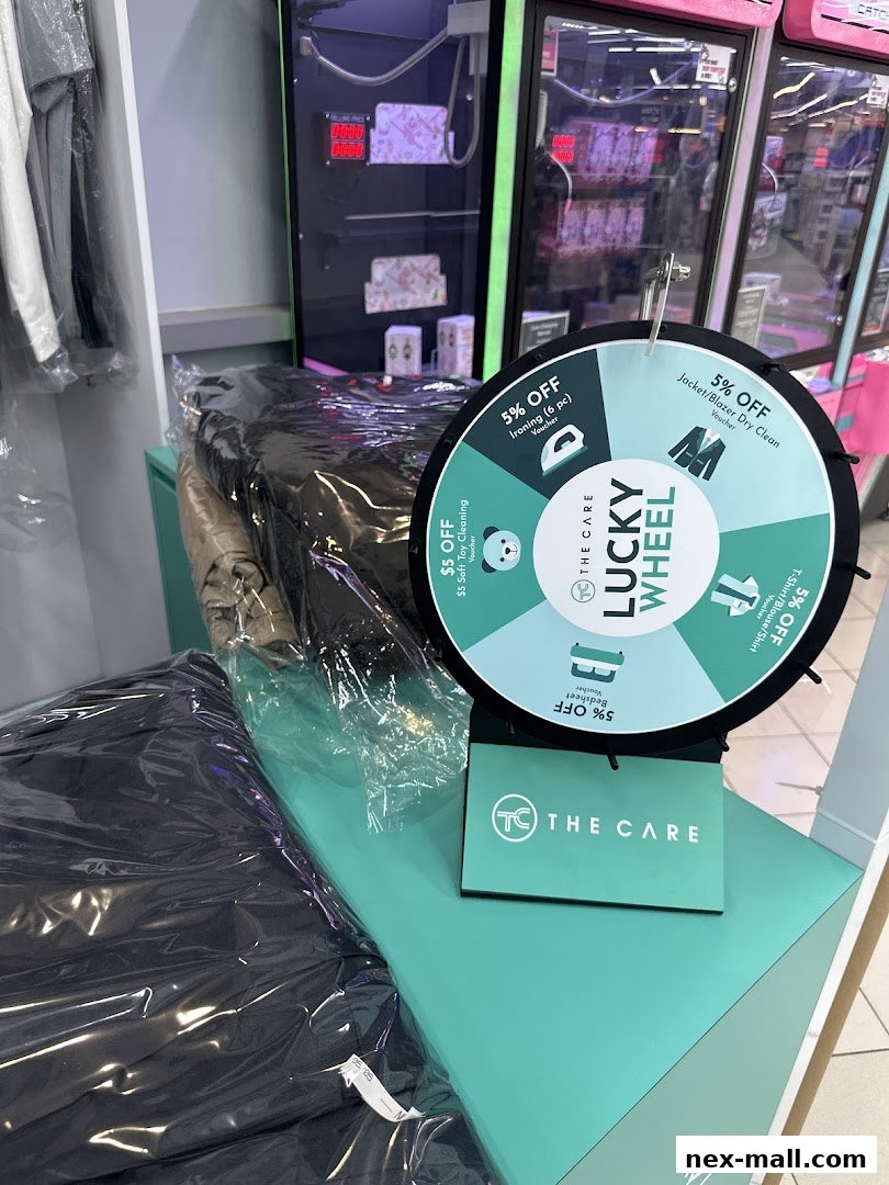 A lucky wheel promotion for laundry services with various discounts displayed.
