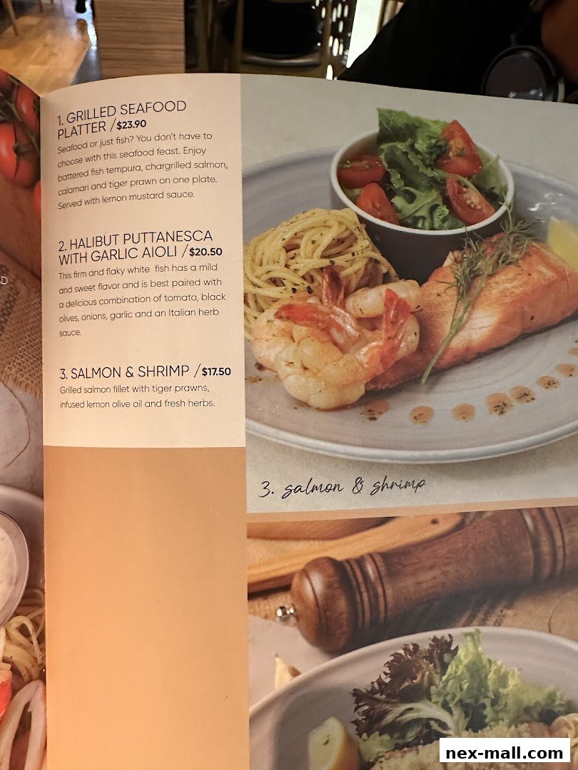 A menu from Hot Tomato featuring seafood dishes with descriptions and prices.