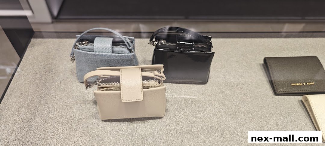 A display of small, stylish handbags and wallets from Charles & Keith.
