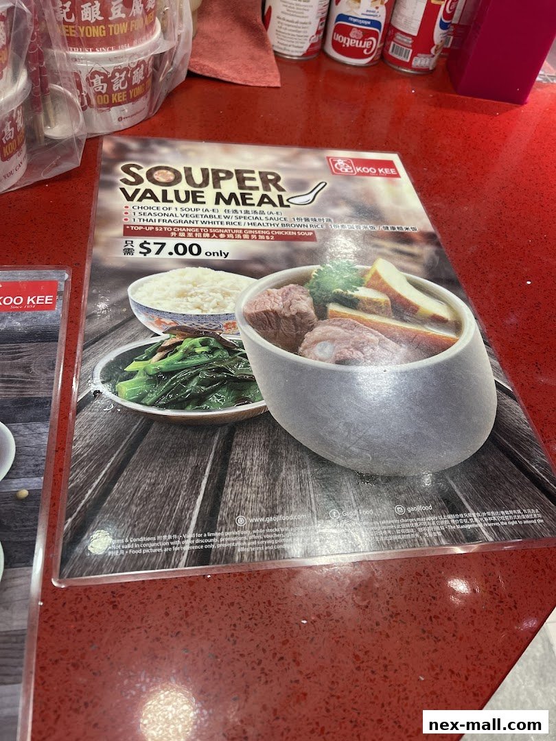 A menu for Koo Kee's Souper Value Meal featuring soup, vegetables, and rice.