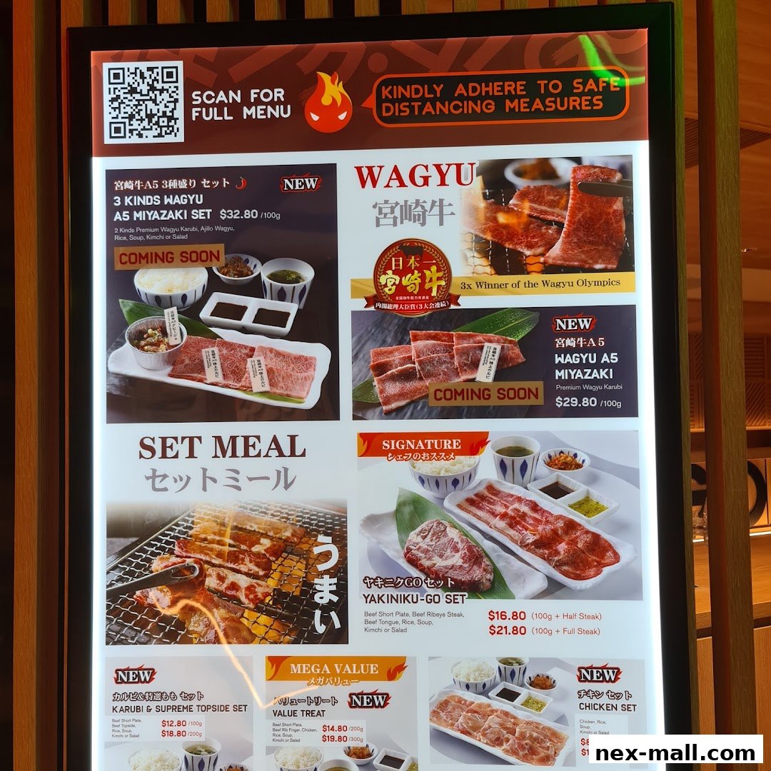 A digital menu board showcasing various Wagyu beef sets and chicken sets with prices.