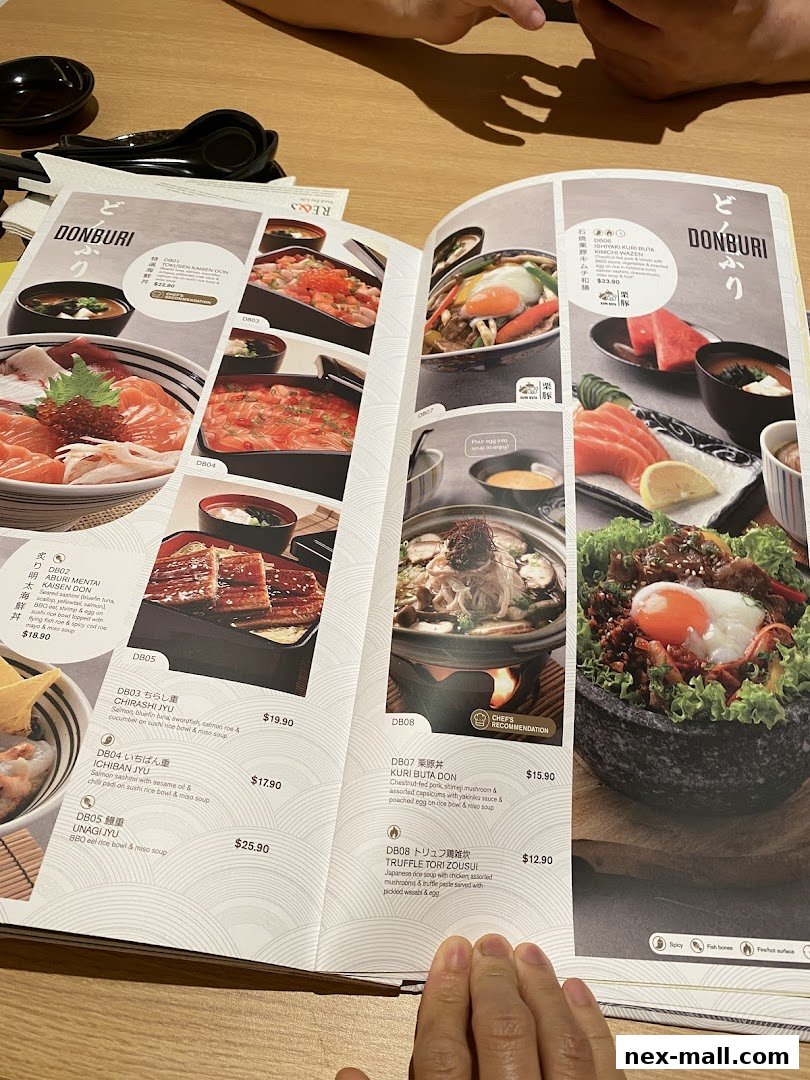 A menu open to the Donburi section, showcasing various Japanese rice bowl dishes with appetizing photos.