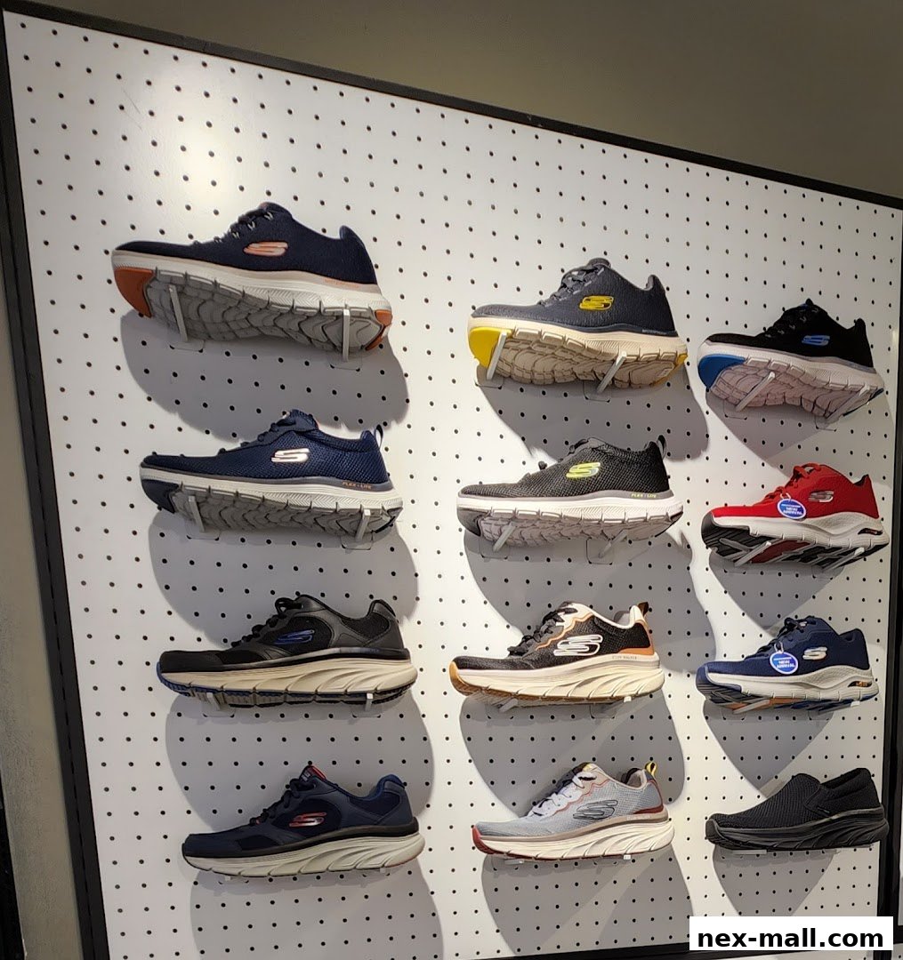 A wall display showcasing various Skechers athletic shoes in different colors and styles.