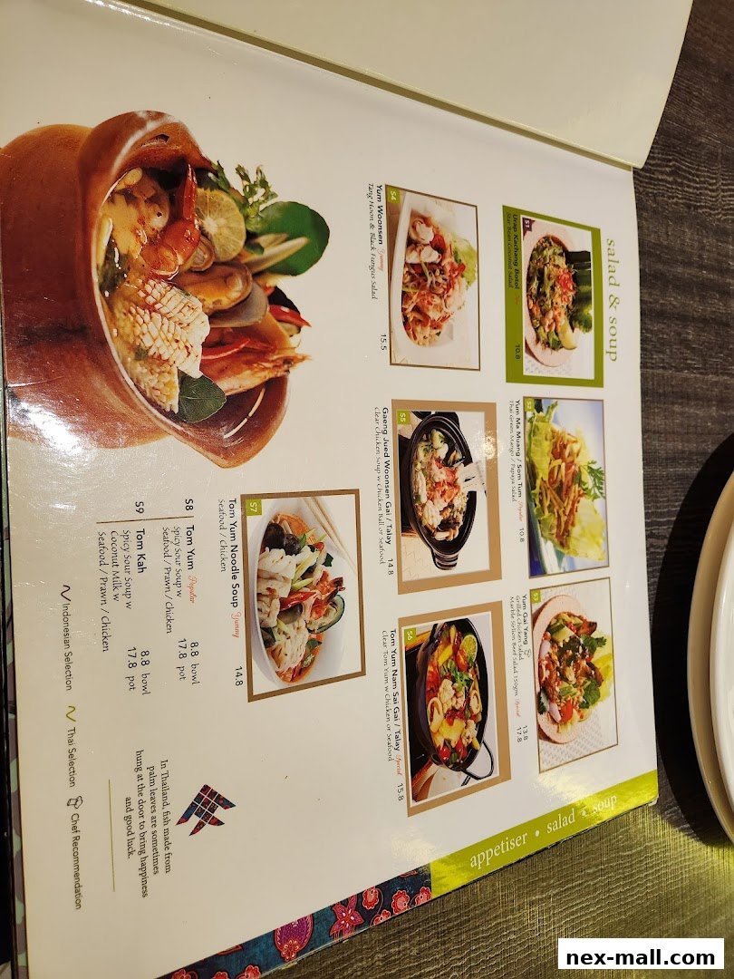 A menu page from Bali Thai NEX featuring Thai salads, soups, and appetizers with enticing food photography.