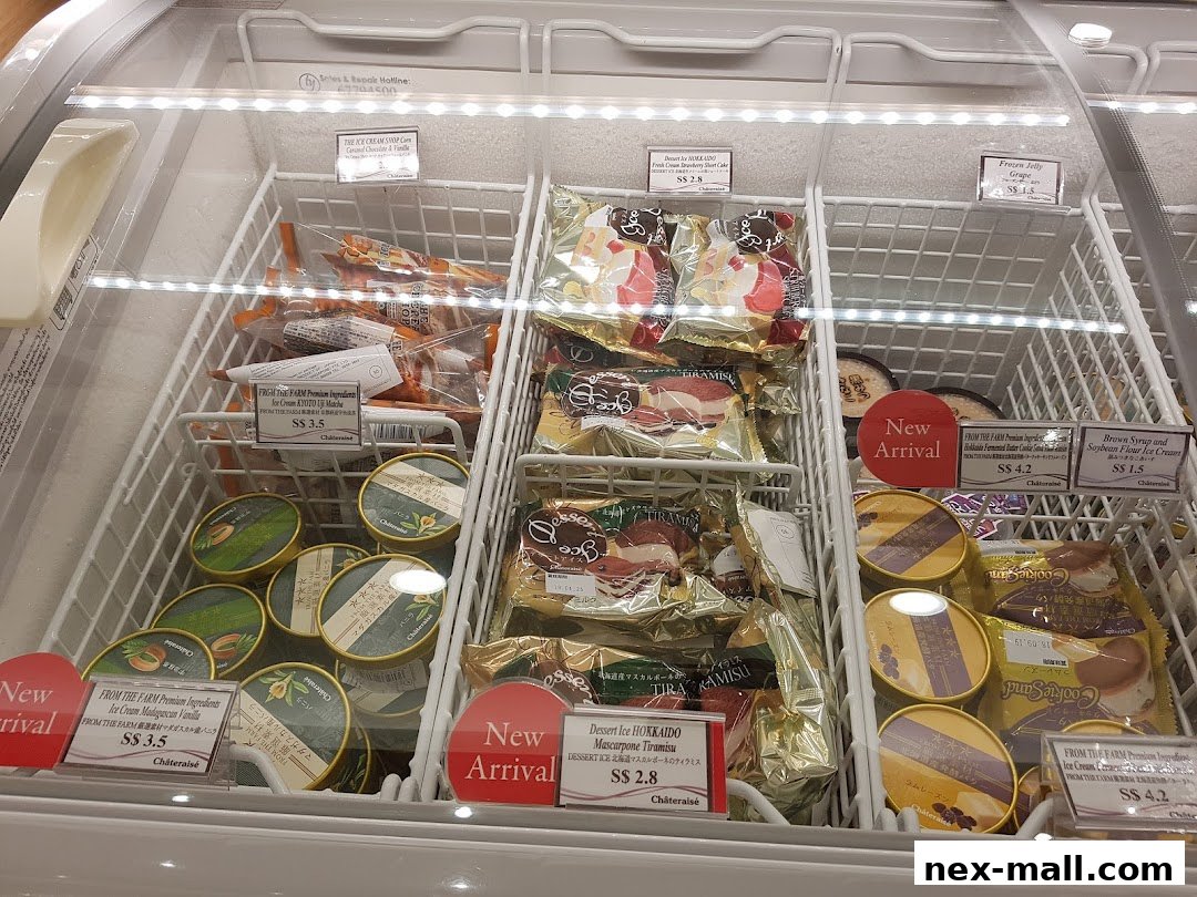 A freezer display case filled with various Châteraisé ice cream products and desserts.