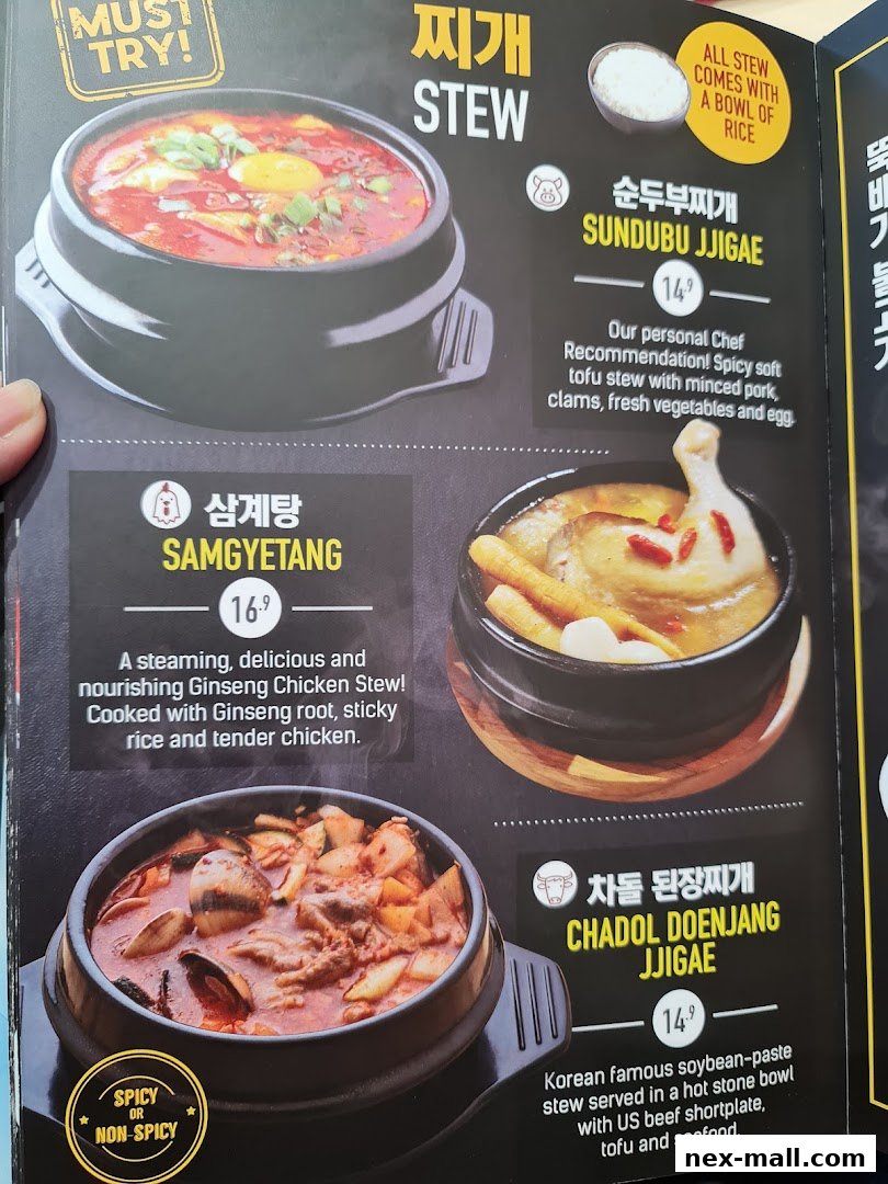 A menu featuring Korean stews like Sundubu Jjigae, Samgyetang, and Chadol Doenjang Jjigae.