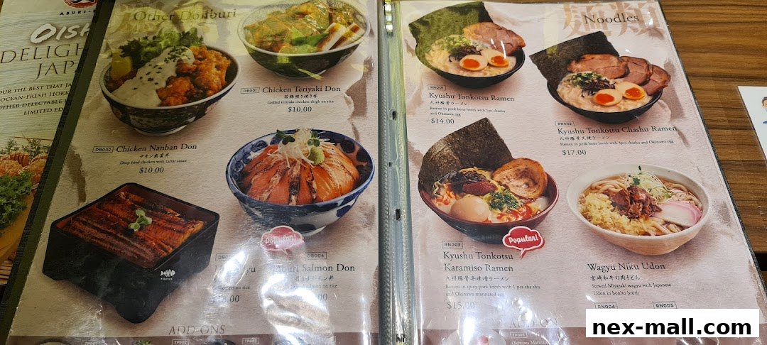A menu from Aburi-EN Nex showcasing various Japanese dishes like Donburi, Ramen, and Udon.