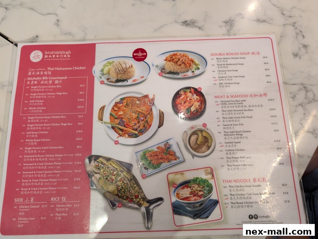 A menu from Go-Ang Pratunam Chicken Rice featuring various chicken dishes, soups, seafood, and noodles.