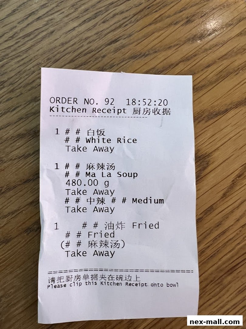 A kitchen receipt from Gong Yuan Ma La Tang listing orders for white rice, mala soup, and fried items.