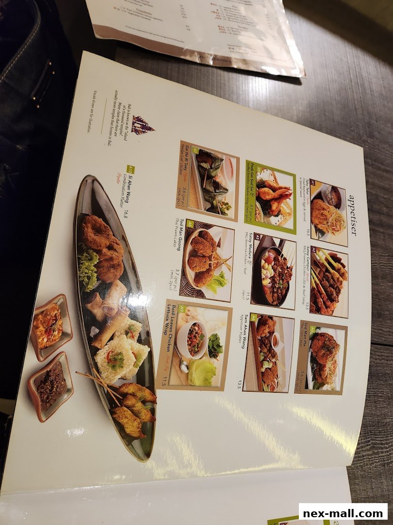 A menu from Bali Thai NEX featuring appetizers like chicken wings, satay, and prawn cakes.