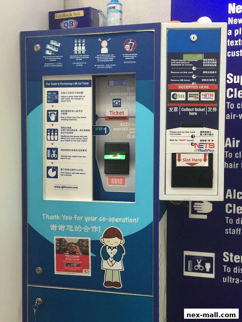 A ticket vending machine for QB House hair salon, showing instructions and payment options.