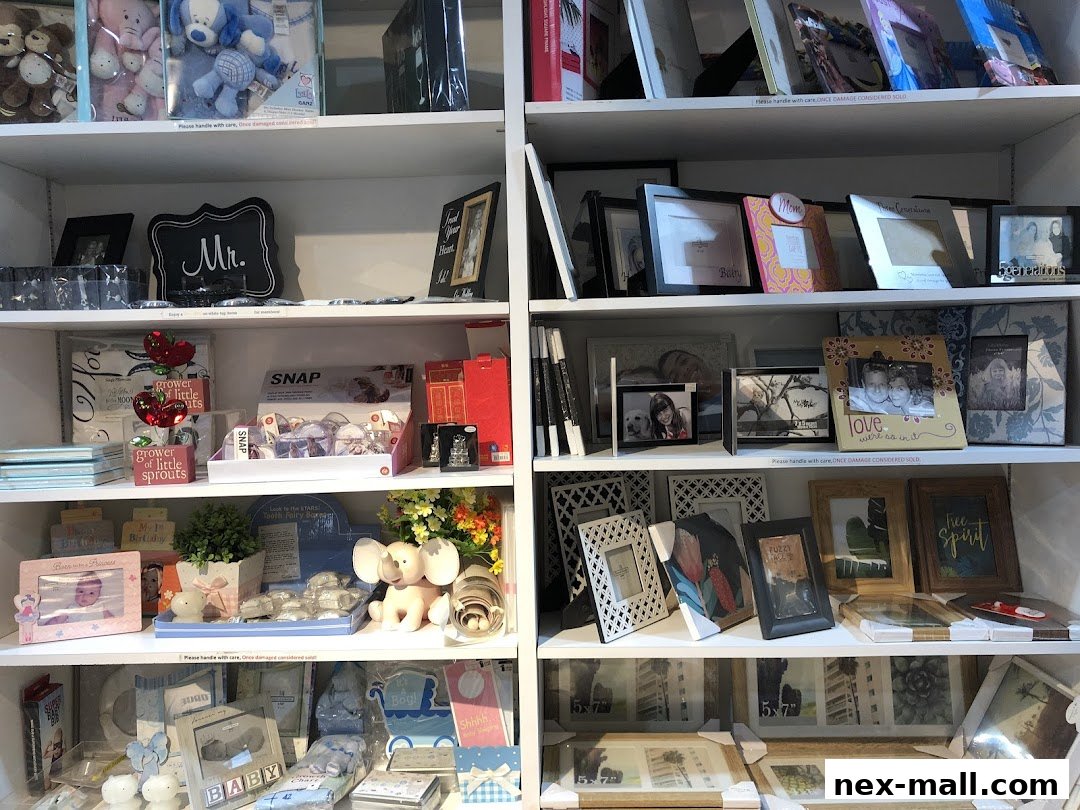 Shelves filled with photo frames, baby gifts, and decorative items.