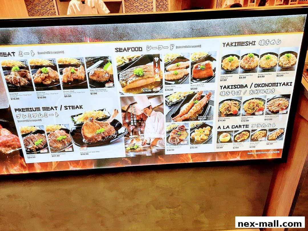 A digital menu board displaying various Japanese food items with images and prices.