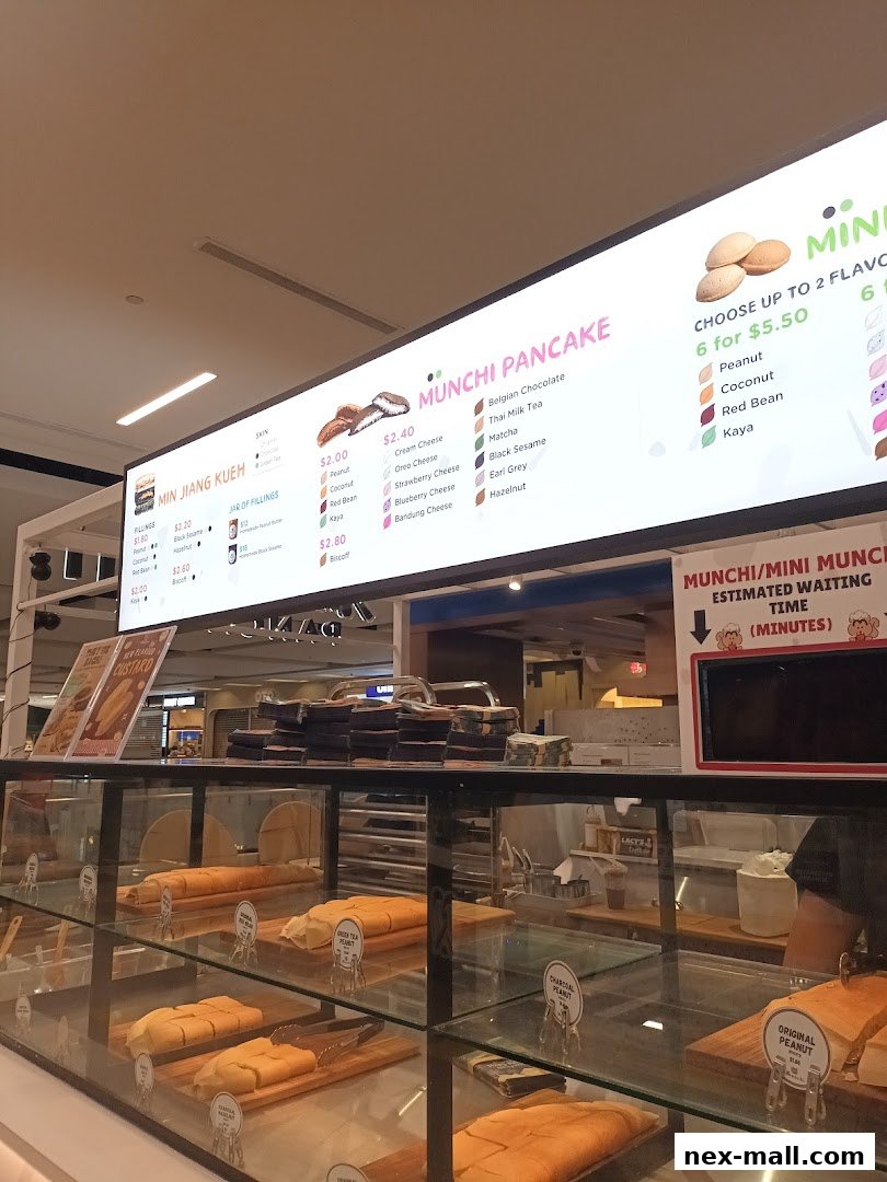 A display of Munchi Pancakes and Min Jiang Kueh with various fillings and flavors.