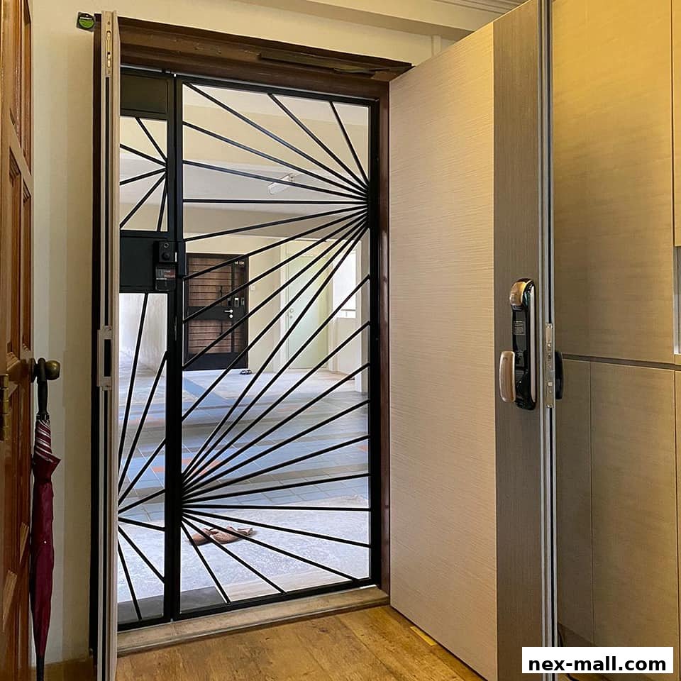 A modern digital lock installed on a sleek door with a decorative metal gate.