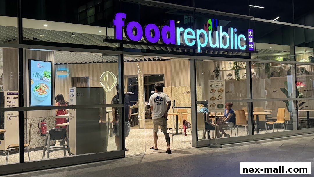 The brightly lit entrance of Food Republic at NEX, showcasing its modern interior and dining area.