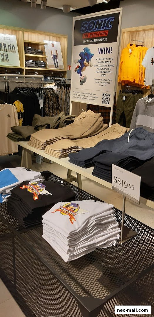H&M store interior featuring Sonic the Hedgehog merchandise and a promotional poster.