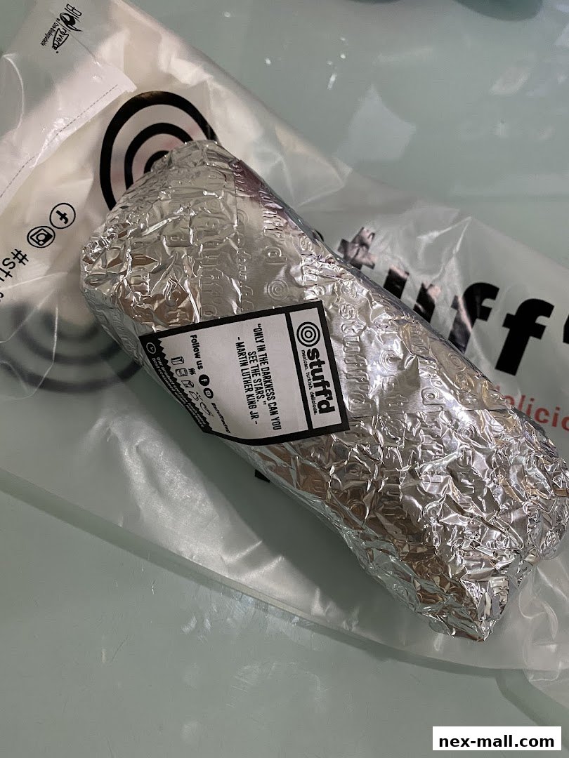 A foil-wrapped burrito from Stuff'd, a Mexican and Turkish food establishment.
