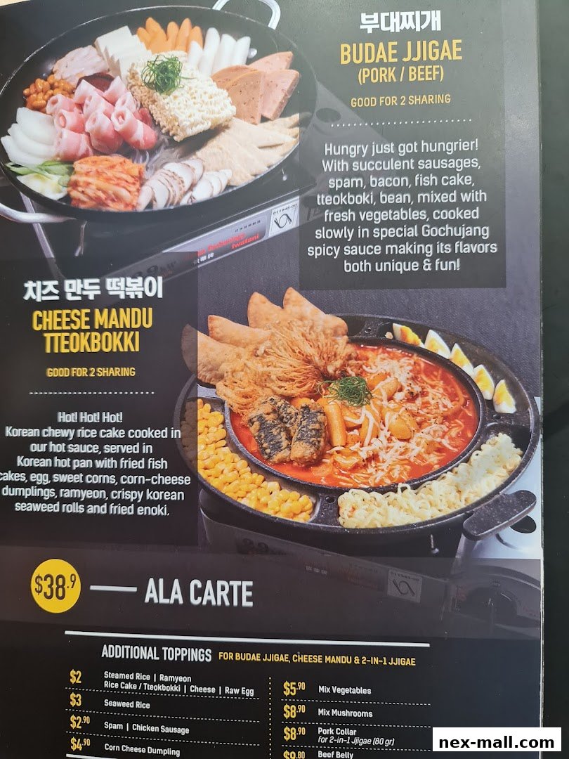 A menu showcasing Korean dishes like Budae Jjigae and Cheese Mandu Tteokbokki with additional toppings.