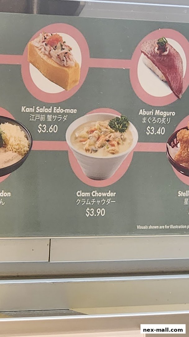 A menu display showing various sushi items and clam chowder.