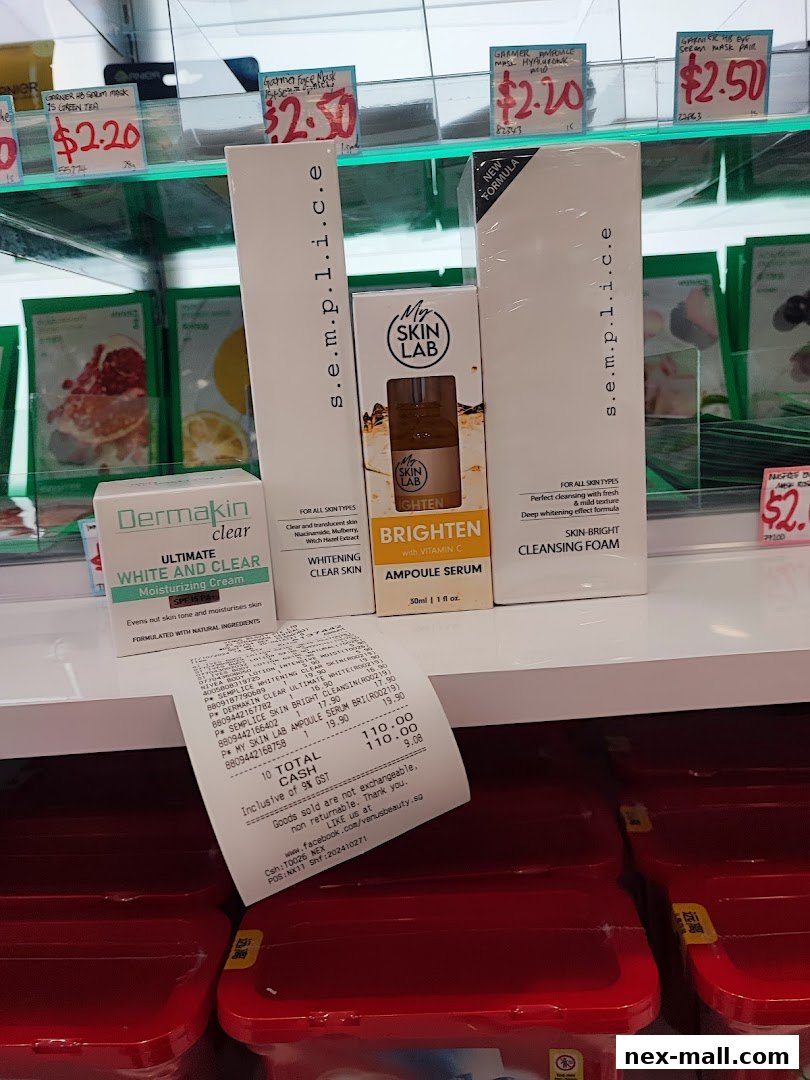 A display of skincare products with prices and a receipt from Venus Beauty NEX.