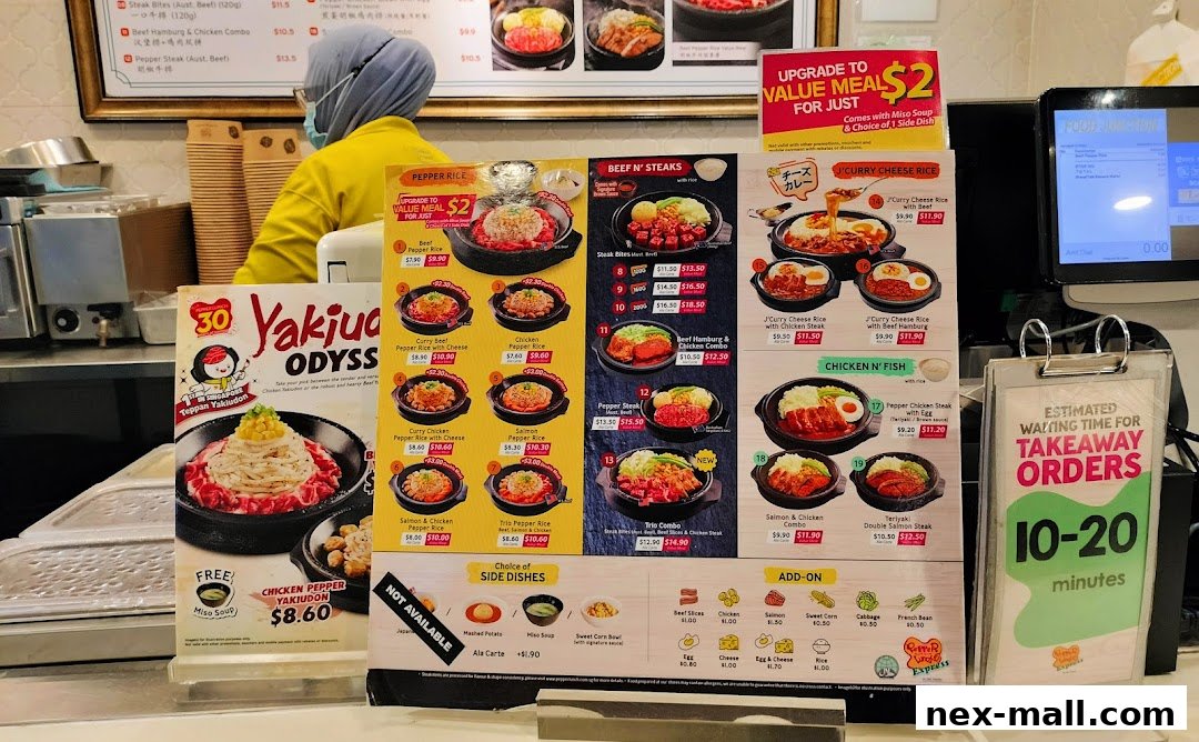 A menu display for Pepper Lunch Express featuring various rice dishes, steak, and chicken options.