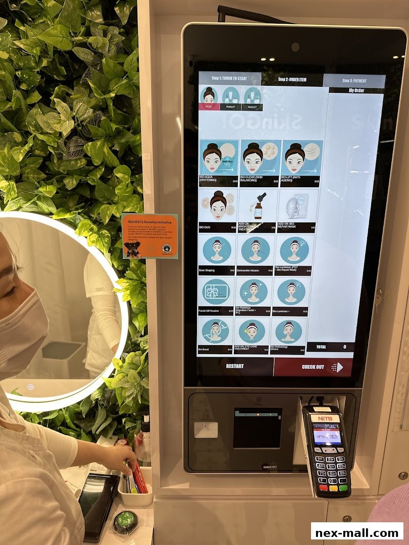 A self-order kiosk for SkinGO! with various skincare treatments displayed.