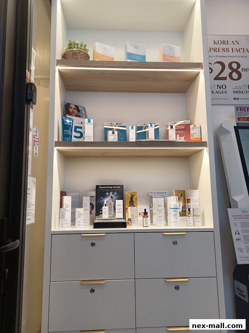 Shelves displaying Korean skincare products and promotional materials for Kskin.