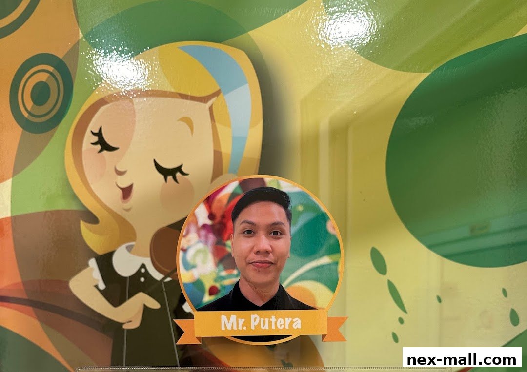 A portrait of Mr. Putera is displayed on a colorful background with cartoon characters.