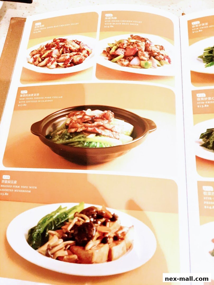 A menu page from Canton Paradise featuring various Chinese dishes with appetizing photos.