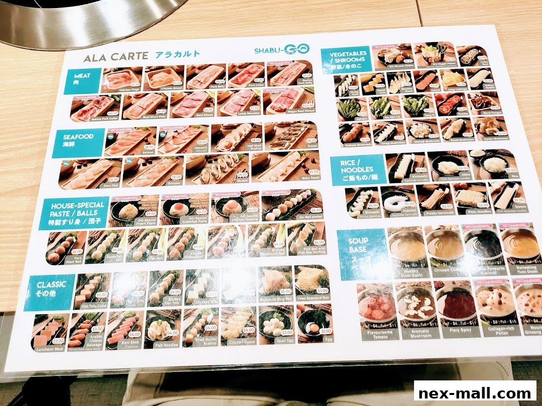 A menu for SHABU-GO featuring various meat, seafood, vegetables, rice, noodles, and soup bases.