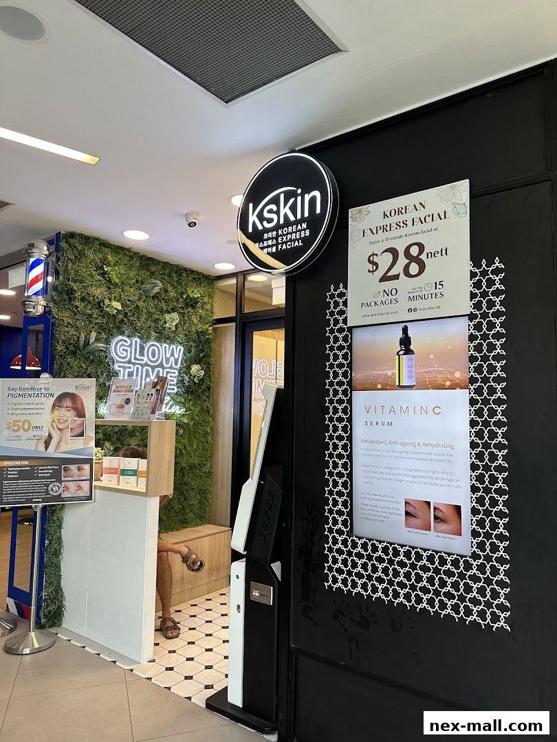The entrance of Kskin Korean Express Facial shop with promotional posters and a glowing sign.